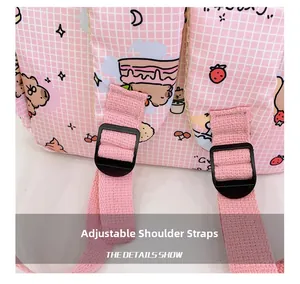 Close-up of adjustable pink woven shoulder strap with black buckle on child backpack