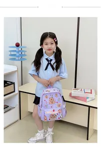 Girl carrying purple plaid school backpack with cute Capybara cartoon prints