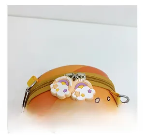 Detail of cute hamburger-shaped silicone kids bag featuring smooth double zippers
