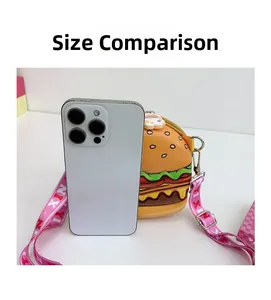 Mini hamburger crossbody bag for kids compared to a smartphone showing its compact size