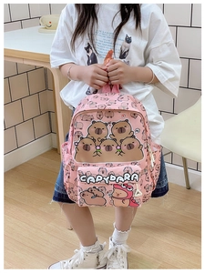 Detailed pink backpack for kids with cute Capybara patterns and multi-pocket storage