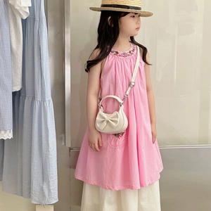 Girl's pink cotton linen dress with floral embroidery and bow handbag accessory