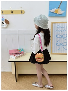 Toddler girl wearing creative cartoon hamburger crossbody bag with pink strap detail