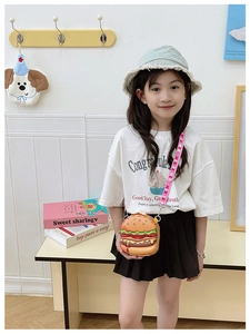 Detail of creative burger-shaped kids crossbody bag with 3D layers and colorful strap