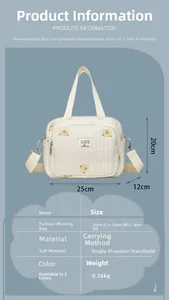 Guide des tailles détaillé pour le sac à langer matelassé avec motif d'ours