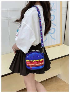Detail of creative burger-shaped blue crossbody bag with vibrant silicone layers for kids