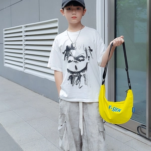 Kids bright yellow crescent crossbody bag with blue lettering and adjustable black strap