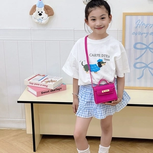 Mini rose pink litchi grain leather crossbody bag for kids with metal lock and handle