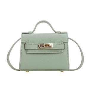 Mini mint green pebbled leather trapezoid crossbody bag with gold buckle for kids