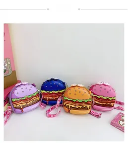 Detailed view of four colorful mini hamburger silicone crossbody bags for kids