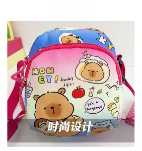 Detail of cute cartoon bear print on a colorful gradient children's crossbody bag