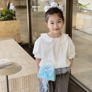 Sac à main bleu clair en dentelle pour fille avec grand nœud et poignée en perles chic