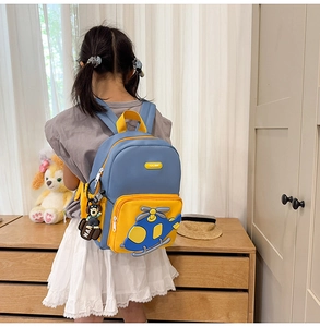 Detail of the thick padded shoulder straps on the blue helicopter backpack for kids