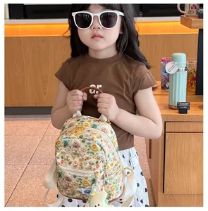 Toddler backpack featuring 3D floral embroidery and cute bear motifs with adjustable straps