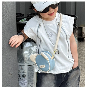 Close-up of a kids blue bear crossbody bag showing pebble grain texture and adjustable strap