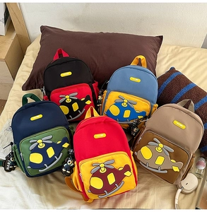 Detailed set of five colorful cartoon helicopter backpacks for kindergarten children