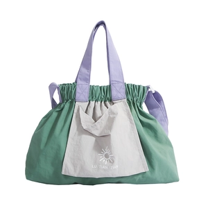 Green and lilac contrast large capacity kids tote bag with drawstring pleated closure