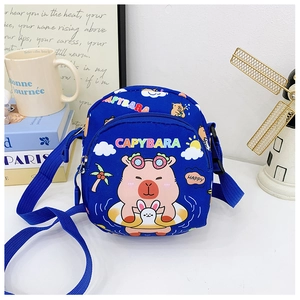Detail of blue canvas kids crossbody bag with cute cartoon capybara print and zipper