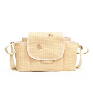 Sac à couches matelassé beige avec broderie d'ours et sangles réglables pour poussettes