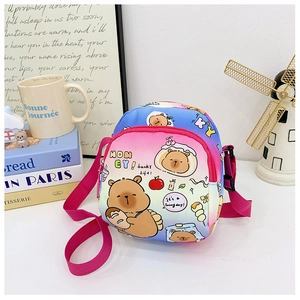 Detail of colorful gradient kids crossbody bag with cute cartoon bear prints and strap