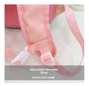 Detail view of pink backpack featuring adjustable straps with breathable honeycomb mesh