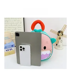Visual size comparison of the cute cartoon kids backpack with a tablet and smartphone