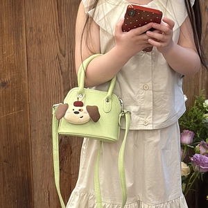 Mint green mini crossbody bag for girls with cute puppy plush charm and top handles