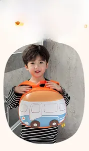 Detail view of the bus-shaped toddler backpack with durable fabric and cute 3D wheels