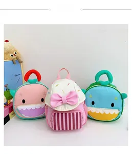 Detailed display of cute shark and bow cartoon backpacks for kindergarten children