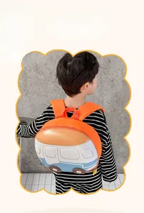 Detail of padded shoulder straps on a lightweight orange bus-shaped kids backpack