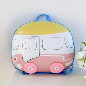 Detail view of bus-shaped hardshell kids backpack with colorful EVA material and cute wheels