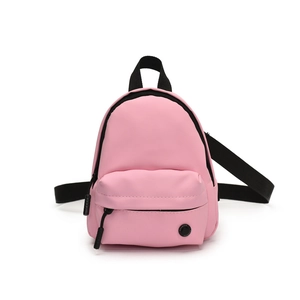 Mini sac bandoulière rose pour enfants avec fermetures noires et patch tendance