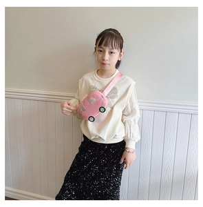 Detail of pink cartoon car canvas chest bag for kids with adjustable shoulder strap