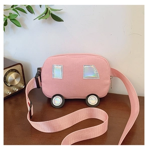 Detail view of pink car-shaped canvas bag with holographic windows and adjustable strap