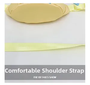 Detail showing the adjustable high-density yellow shoulder strap of the kids chest bag