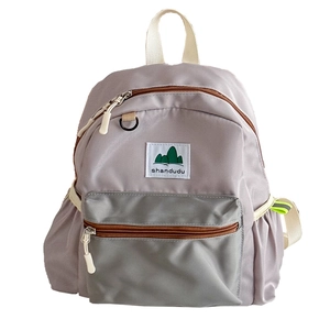 Kids large capacity school backpack in grey-purple and green color block design