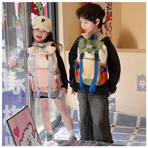 Close-up of kids drawstring backpacks with dual buckle flaps and side mesh pockets