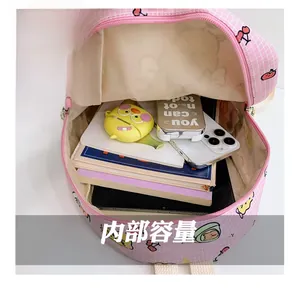 Pink checkered kids backpack with large capacity interior for stationery and electronics