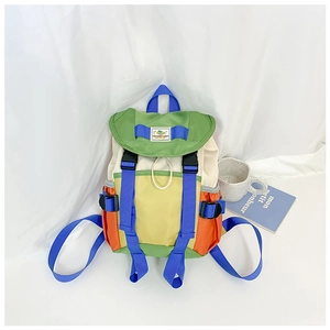 Detail of color-block kid backpack with drawstring closure and secure buckle strap