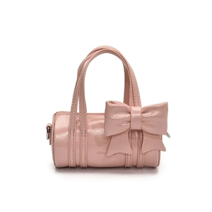 Pink patent leather cylinder handbag for girls with a large sweet bow decoration