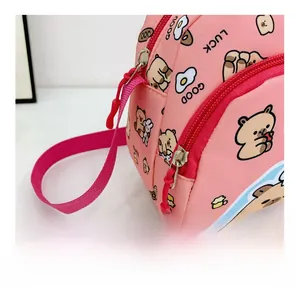 Pink kids crossbody bag detail showing adjustable shoulder strap and cute bear print