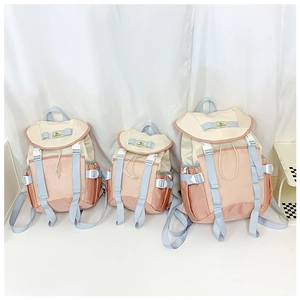 Detailed comparison showing three sizes of the tricolor drawstring canvas backpack