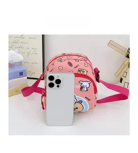 Pink cartoon print children's backpack size comparison with a white smartphone