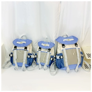 Detailed comparison of three outdoor backpack sizes with contrast color blocked design