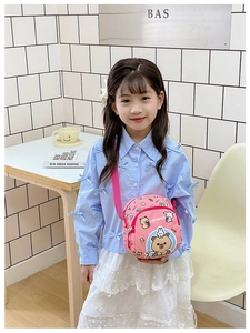 Detailed view of pink capybara cartoon crossbody bag with adjustable strap for kids