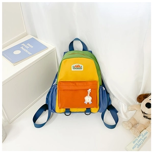 Detailed view of kids' colorblock backpack featuring organized storage pockets and vibrant design