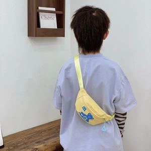 Vibrant yellow canvas waist bag for kids featuring a cute blue bear print and adjustable strap