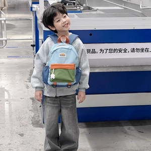 Three-color patchwork school backpack for kids with large capacity and side pockets