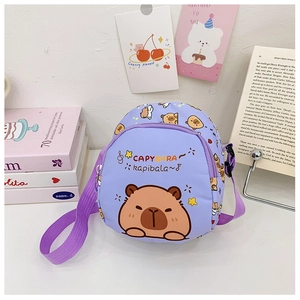 Detail of purple canvas kids crossbody bag with cute cartoon Capybara print and zipper
