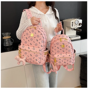 Comparaison des grands et petits sacs à dos roses GICA IMAG avec imprimés chat mignon